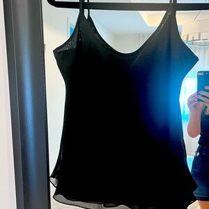 The sequin top is very fluid and complements the look so beautifully.